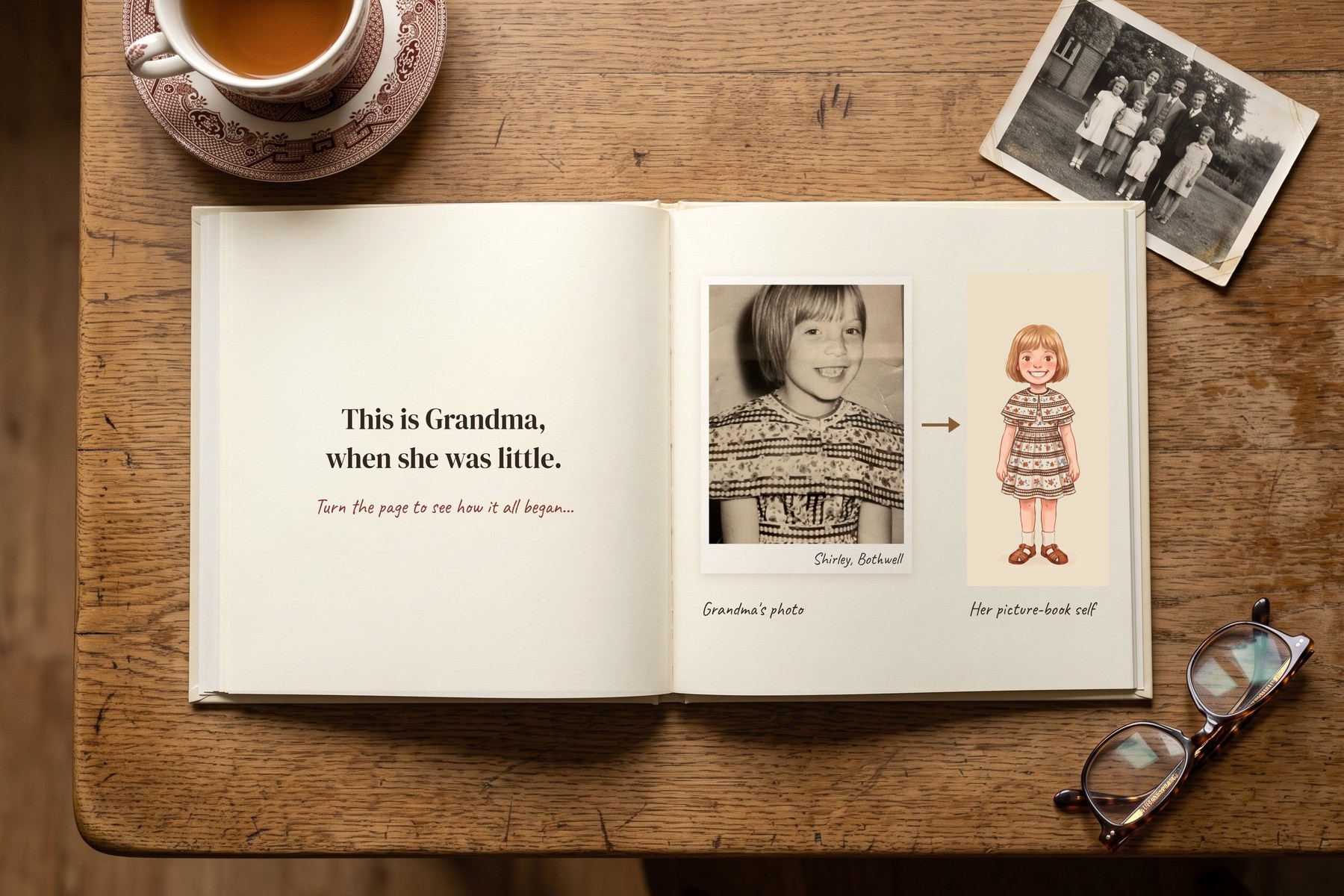 An open hardback book on a kitchen table. The right-hand page shows Shirley's real black-and-white childhood photo, an arrow, and her illustrated picture-book self in the same dress